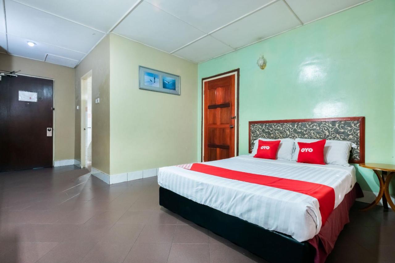 تاواو Oyo 89997 Kurnia Hotel المظهر الخارجي الصورة