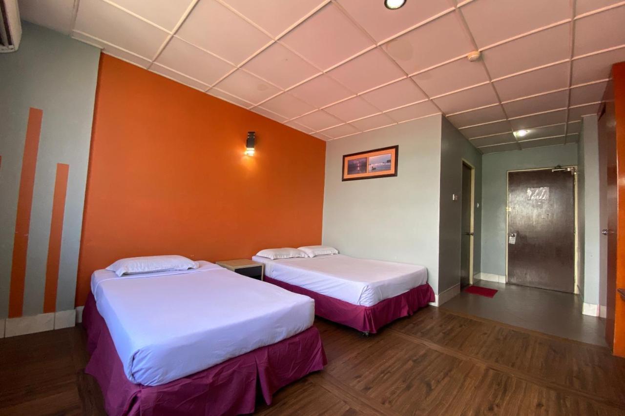 تاواو Oyo 89997 Kurnia Hotel المظهر الخارجي الصورة